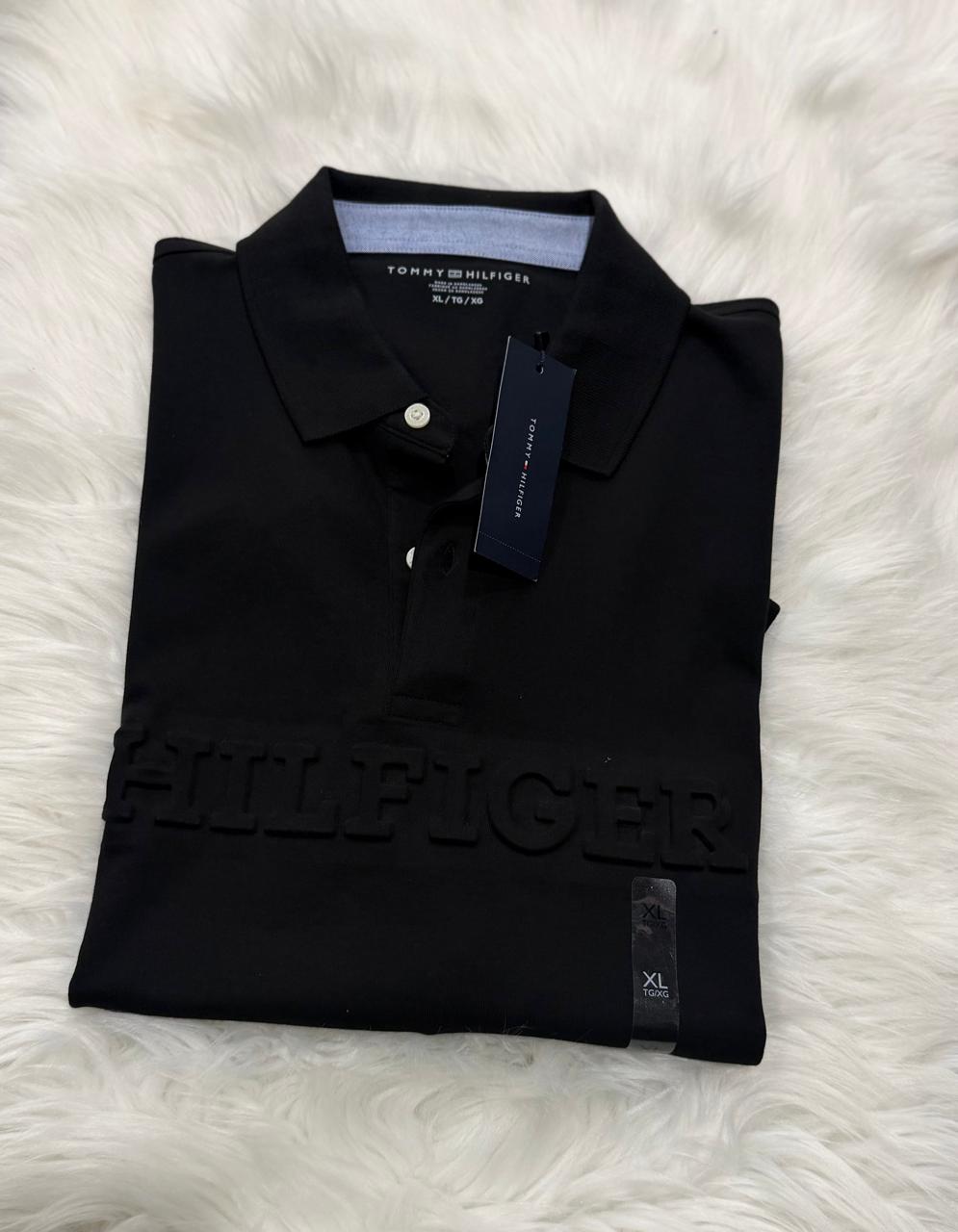 Polo Tommy Hilfiger negro con logo tonal para caballero talla XL